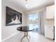 Bright kitchen featuring white cabinets, stainless steel appliances, and a sliding glass door to the backyard pool at 11397 122Nd Ave, Largo, FL 33778