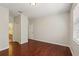Spacious bedroom shows hardwood floors, a window, and a closet at 12817 Darby Ridge Dr, Tampa, FL 33624