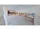 Picture showcasing the living room of this home; needs complete remodel with new flooring and paint at 1311 Sea Gull S Dr, St Petersburg, FL 33707