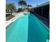 Gorgeous backyard featuring a refreshing pool and jacuzzi alongside the home's private dock at 1311 Sea Gull S Dr, St Petersburg, FL 33707
