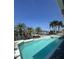 Stunning waterfront home with a private pool, spa, and boat dock, surrounded by lush landscaping at 1311 Sea Gull S Dr, St Petersburg, FL 33707