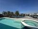 A pool, spa and dock combine to provide a luxurious waterfront experience at 1311 Sea Gull S Dr, St Petersburg, FL 33707