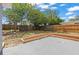 Well-maintained backyard featuring a new fence, patio and firepit at 1427 Gerard Ln, Holiday, FL 34690