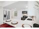 Modern kitchen with white cabinets, stainless steel appliances, a stylish island and seating for a modern design at 1601 54Th S St, Gulfport, FL 33707