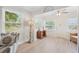 Bright living room featuring plenty of natural light, modern flooring, and a welcoming atmosphere at 1601 54Th S St, Gulfport, FL 33707