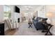 Inviting living room featuring a cozy fireplace, comfortable seating, and abundant natural light at 1601 54Th S St, Gulfport, FL 33707
