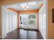 Open living area with sliding glass doors leading to the patio and abundant natural light at 1702 Cordova Green, Seminole, FL 33777