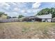 Large fenced back yard featuring a screened-in pool and plenty of green space for Gathering enjoyment at 1912 Blue Sage Ct, Brandon, FL 33511