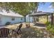 Well maintained backyard featuring a gazebo, shed, mature trees and outdoor seating at 2014 E Broad St, Tampa, FL 33610