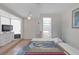Bedroom featuring bright and airy features, tile flooring, and an en suite bathroom at 2014 E Broad St, Tampa, FL 33610