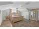 Cozy bedroom with wood floors, stylish furnishings, and a comfortable, inviting atmosphere at 2014 E Broad St, Tampa, FL 33610