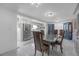 Bright dining area with stainless steel refrigerator and classic kitchen accents at 2014 E Broad St, Tampa, FL 33610