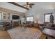 Bright living room with high ceilings, built-in cabinets, and comfortable seating at 2014 E Broad St, Tampa, FL 33610