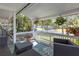 Comfortable porch featuring outdoor seating and views of the landscaped surroundings at 2014 E Broad St, Tampa, FL 33610