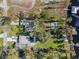 Aerial view of lakefront homes, featuring pools, boat docks, and manicured lawns at 21918 Shamu Dr, Land O Lakes, FL 34639