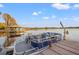 Pontoon boat on a dock with water views at 21918 Shamu Dr, Land O Lakes, FL 34639