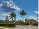 Gated community entrance near playground and clubhouse at 2463 Carnation Ct, North Port, FL 34289