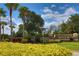 Landscaped median and entrance sign for Cedar Grove community at 2463 Carnation Ct, North Port, FL 34289
