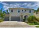 Charming home with a three-car garage and well-maintained landscaping at 2463 Carnation Ct, North Port, FL 34289