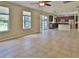 Open-concept living area featuring the kitchen and dining area, seamlessly blending for modern living at 2463 Carnation Ct, North Port, FL 34289