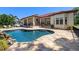 Spacious pool and patio with luxurious outdoor living and dining space at 2613 N Dundee St, Tampa, FL 33629
