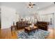 Spacious living room open to the kitchen and dining areas, with comfortable seating at 2613 N Dundee St, Tampa, FL 33629