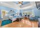 Bright and spacious main bedroom suite with sitting area and large windows at 2613 N Dundee St, Tampa, FL 33629