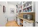 Well-organized pantry with granite countertops, shelving, cabinets and drawers for plenty of storage at 2613 N Dundee St, Tampa, FL 33629