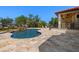 Inviting pool with rock feature and spacious deck, perfect for outdoor enjoyment at 2613 N Dundee St, Tampa, FL 33629