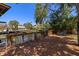 A waterfront wooden deck with bench seating, providing a serene outdoor space for relaxation and enjoyment of the surrounding water views at 2613 N Dundee St, Tampa, FL 33629