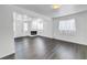 Inviting living room with fireplace, gray flooring and natural light at 2719 Boca Ciega N Dr, St Petersburg, FL 33710
