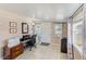Functional living room features a dedicated work space with ample natural light at 27466 Us Highway 19 N # 56, Clearwater, FL 33761
