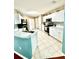 Functional kitchen featuring white cabinetry, neutral countertops, and modern appliances at 2776 Golf Lake Dr # 1, Plant City, FL 33566
