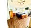 Inviting main bedroom with wood floors, ample natural light, and light blue paint at 2776 Golf Lake Dr # 1, Plant City, FL 33566