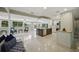Bright open-concept living space features a large island, modern kitchen, and relaxing seating area at 301 62Nd S Ave, St Petersburg, FL 33705