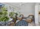 Charming sunroom with tile flooring and large windows that fill the room with natural light at 301 62Nd S Ave, St Petersburg, FL 33705