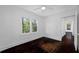 Bedroom featuring hardwood floors, white walls, and natural light at 3100 11Th N Ave, St Petersburg, FL 33713