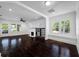 Spacious living room features original hardwood floors, fireplace, ceiling fan and many windows at 3100 11Th N Ave, St Petersburg, FL 33713