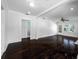 The spacious living room features original hardwood floors, fireplace, ceiling fan and trim at 3100 11Th N Ave, St Petersburg, FL 33713