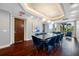 Elegant dining room boasts a large table, comfortable seating, and stunning water views at 331 Cleveland St # 1202, Clearwater, FL 33755