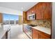 Updated kitchen with stainless steel appliances and views from the connected living area at 331 Cleveland St # 1202, Clearwater, FL 33755