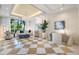 Comfortable lobby featuring stylish furniture, modern art, and ample natural light at 331 Cleveland St # 1202, Clearwater, FL 33755