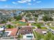 Aerial view showcasing the home's location within a picturesque waterfront community and lush landscaping at 4166 38Th S St, St Petersburg, FL 33711