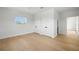 Bedroom featuring two closets, a window, and light wood floors at 4166 38Th S St, St Petersburg, FL 33711