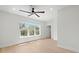 Bright bedroom with a large window, white walls and light wood floors at 4166 38Th S St, St Petersburg, FL 33711