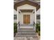 Inviting entryway with a double door and an overhead wood ceiling at 4166 38Th S St, St Petersburg, FL 33711