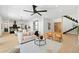 Open-concept living area with hardwood floors and a view of the kitchen at 4166 38Th S St, St Petersburg, FL 33711