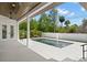 Outdoor pool features clean lines, modern style, and lush landscaping for a serene backyard oasis at 4166 38Th S St, St Petersburg, FL 33711