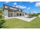 Back of the home features a pool, patio, and sprawling lawn ideal for relaxation and recreation at 4166 38Th S St, St Petersburg, FL 33711
