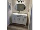 Bathroom featuring a modern vanity with a white countertop and matte black fixtures at 4212 Pasadena Cir, Sarasota, FL 34233
